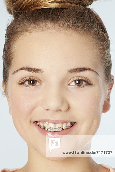 Close up of smiling girl in braces