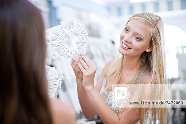 Smiling woman shopping in store