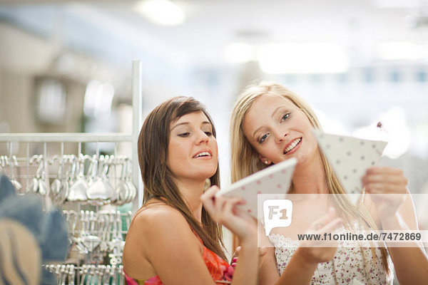 Women shopping together in store