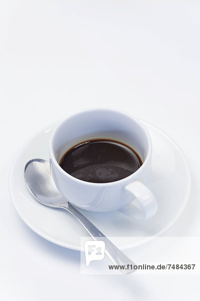 Espresso-Tasse mit Kaffee  Untertasse und Kaffeel÷ffel