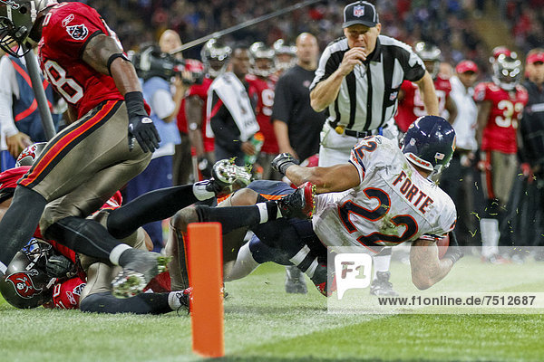RB Matt Forte  #22 Chicago Bears  is tackled during the NFL International game between the Tampa Bay Buccaneers and the Chicago Bears on October 23  2011 in London  England  United Kingdom  Europe