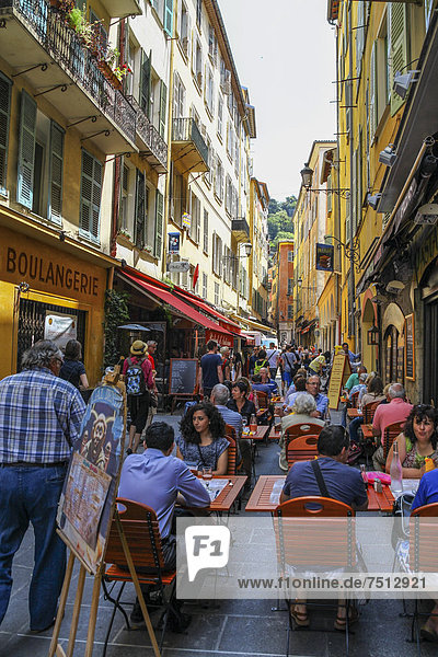 Street scene with a street cafÈ and passers-by  Nice  Cote d'Azur  France  Europe