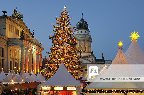 '''Winter Magic at the Gendarmenmarkt''  Christmas market at Gendarmenmarkt square  Schauspielhaus theatre  French Cathedral  dusk  Berlin  Germany  Europe'