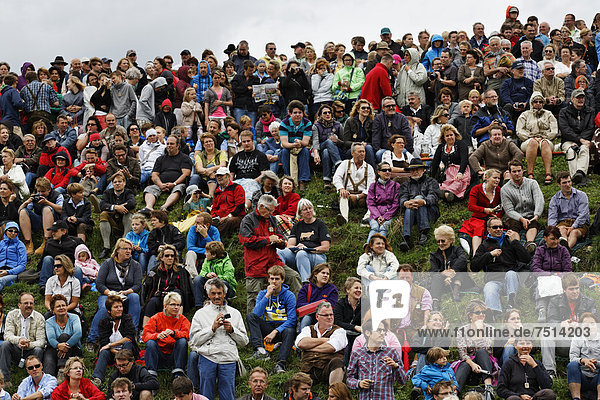 Spectators at the Muensinger Ochsenrennen ox race  Muensing  Fünfseenland region  Upper Bavaria  Bavaria  Germany  Europe