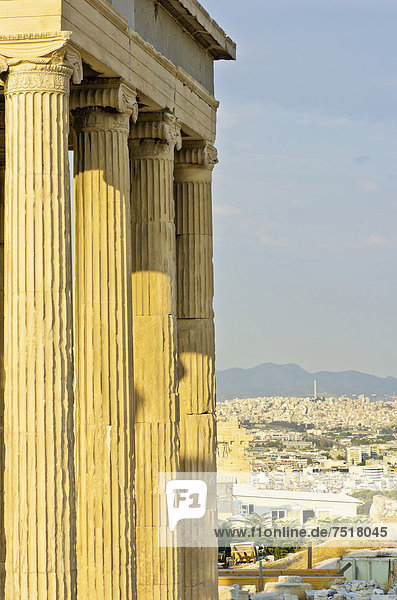 Columns of the Erechtheion temple  looking over the city of Athens  Acropolis  Athens  Greece  Europe