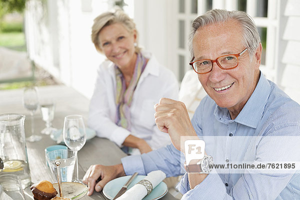 Couple smiling at table together