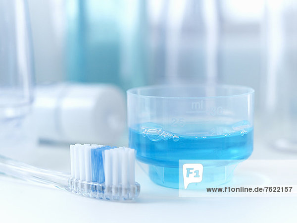 Close up of toothbrush and mouthwash