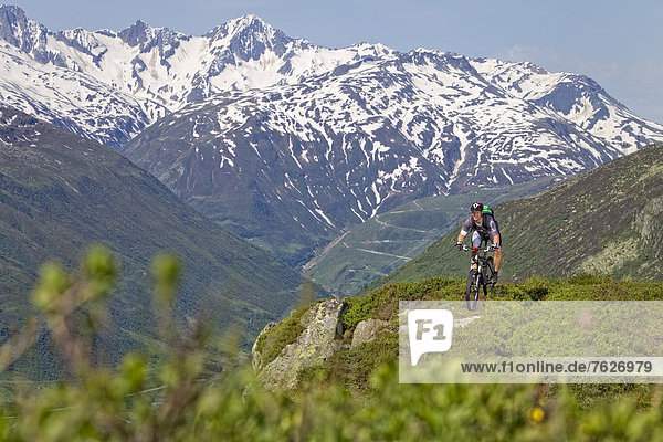 Mountainbiker in the Alps  Andermatt  Switzerland