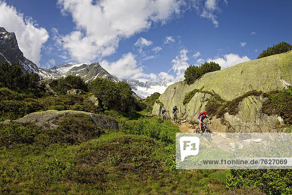 Mountainbikers in the Alps  Andermatt  Switzerland