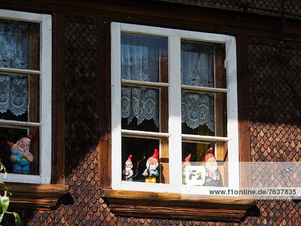 Farm village farmhouse village Emmental facade window window frame garden gnomes house home canton Bern Bern shingle facade Switzerland Europe Wasen pointed cap dwarfs midgets
