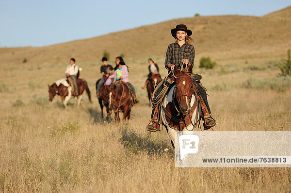 Pacific Northwest  Oregon  USA  United States  America  riding  horseback  sport  horse  ranch  dude  grass  group  girls