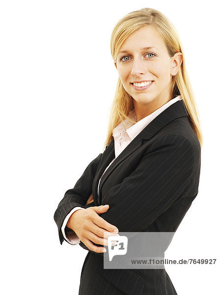 Businesswoman  smiling with her arms crossed