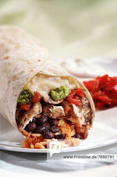 Chicken Burrito with Rice  Beans  Cheese and Guacamole