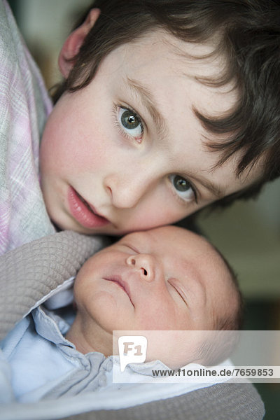 Boy and baby brother  portrait
