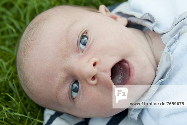 Baby boy with open mouth  portrait