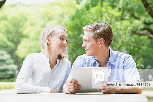 Young couple with tablet