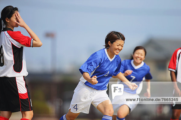 Women Playing Soccer
