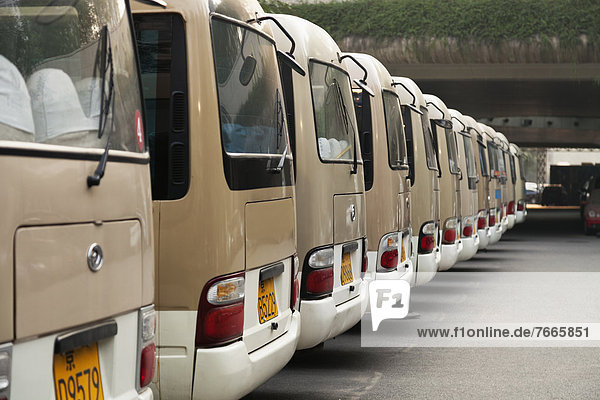 Beijing/row of vans