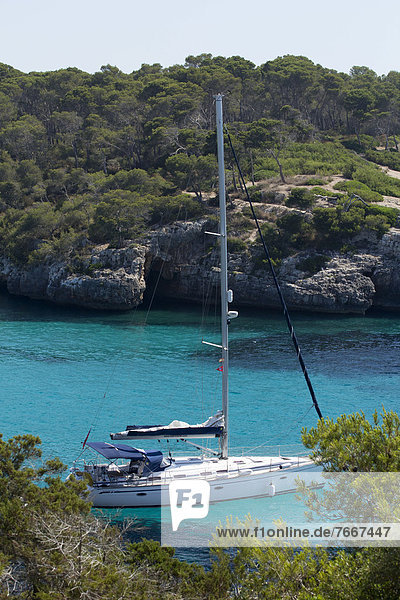 Sailing boat at the harbour entrance of Figuera