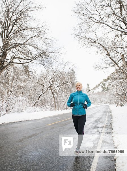 Woman jogging in winter