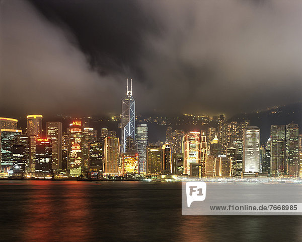 Skyline of Victoria Island  Bank of China Tower  view from Kowloon  night scene