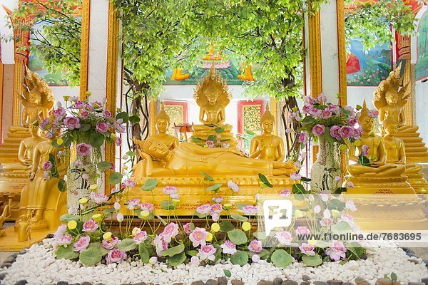 Reclining Buddha and other statues  Karon Beach  Buddhist Temple  Phuket Island  Phuket  Thailand  Southeast Asia  Asia
