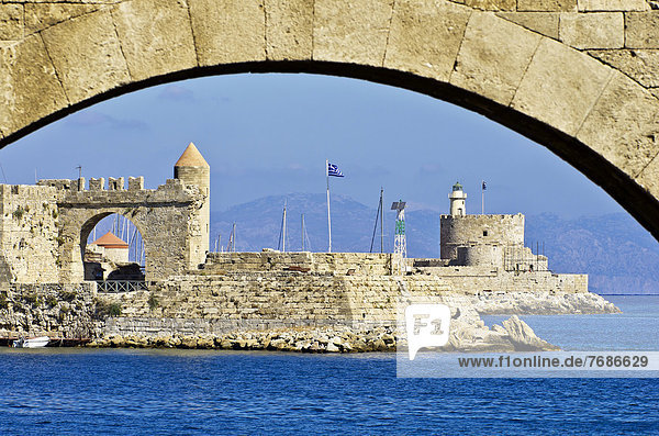 Harbour entrance of Rhodes in front of ramparts or defensive walls