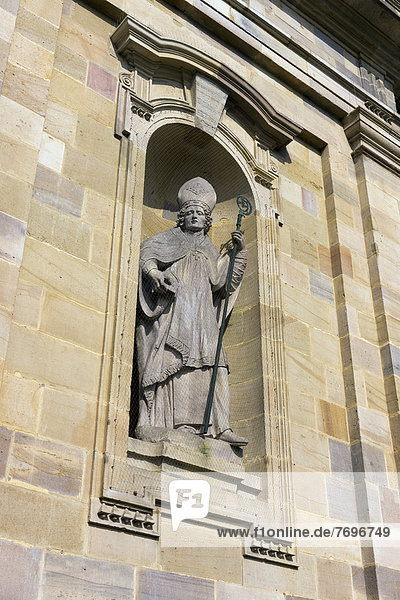 Statue of the monastery's founder Sturmius on the main portal of St. Salvator Cathedral of Fulda  Fulda Cathedral