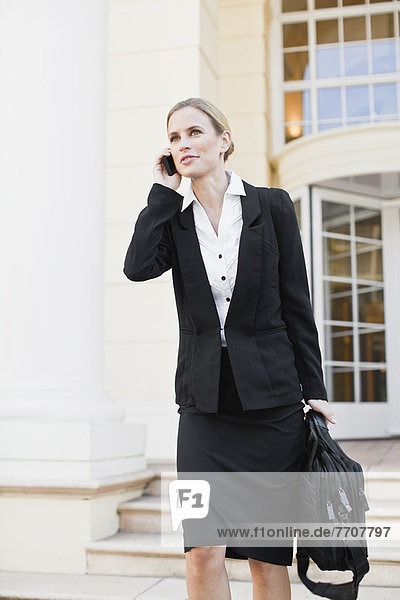 Businesswoman talking on cell phone