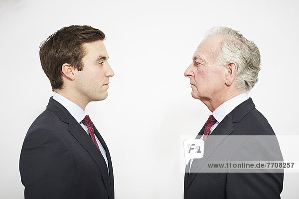 Businessmen facing each other