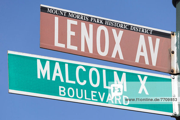 Lenox Avenue und Malcolm X Straßenschilder