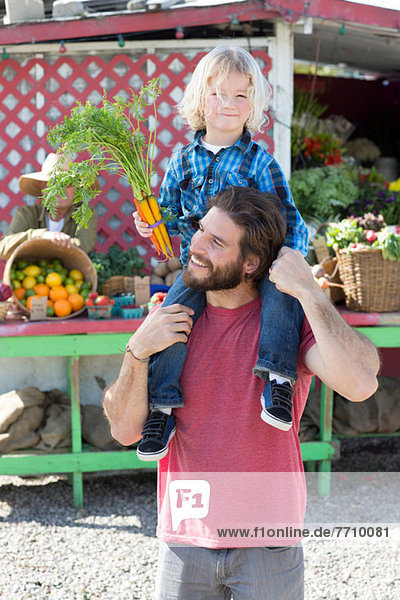 Father and son at farmer?s market