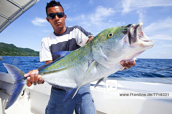 Man holding a jack fish  panama