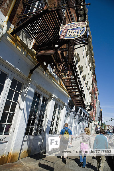 Man Drinking Beer In Bar At Bourbon Street  New Orleans  Louisiana  Usa