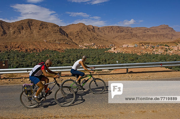 Cyclists Along Route Of 1000 Kasbahs