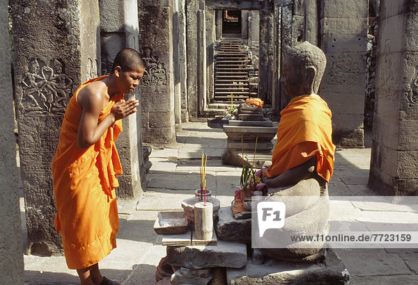 Monk Praying In The Preah Khan Temple