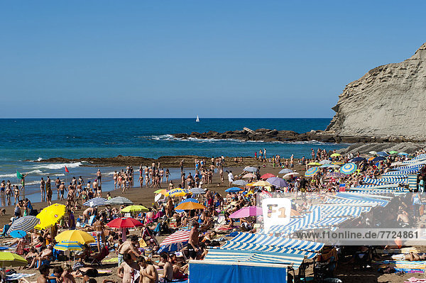 Sunbathing At Itzurun Beach  Zumaia  Basque Country  Spain