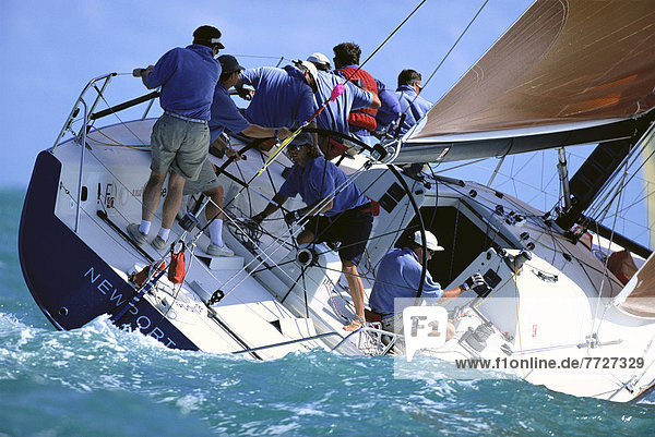 Florida  Key West Race Week  Close-Up Stern View Of Yacht Leaning Into Water  Crew