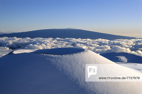Hawaii  Big Island  Mauna Kea  With Snow Covered Cinder Cone  Mauna Loa Background Pale Blue Sky