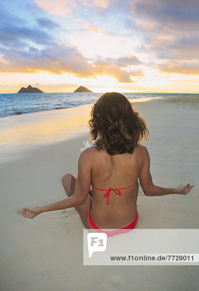 Hawaii  Oahu  Kailua  Lanikai  Young Woman Meditating On Beach.