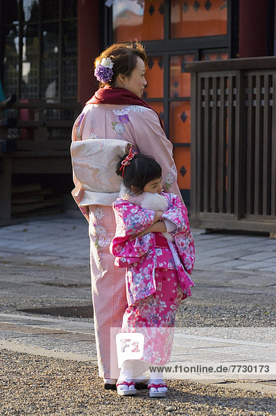 Mother And Daughter Both Wearing Traditional Kimono  Kyoto  Japan