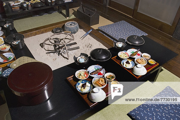 Traditional Japanese Meal Served Around The Fire In The Floor  Shirakawa  Gifu  Japan