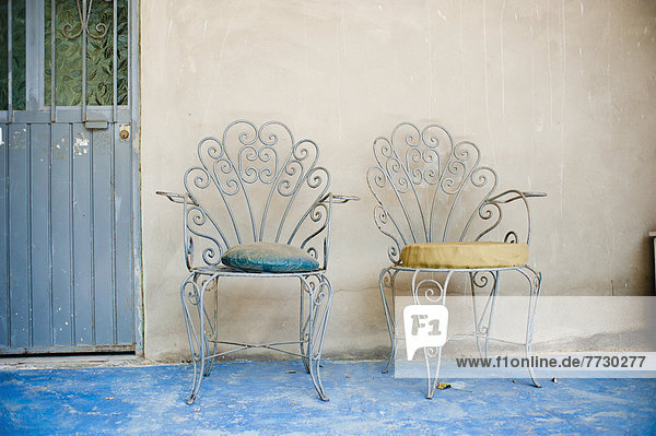 Two Chairs With Cushions Sitting Outside A Doorway  Yelapa  Jalisco  Mexico