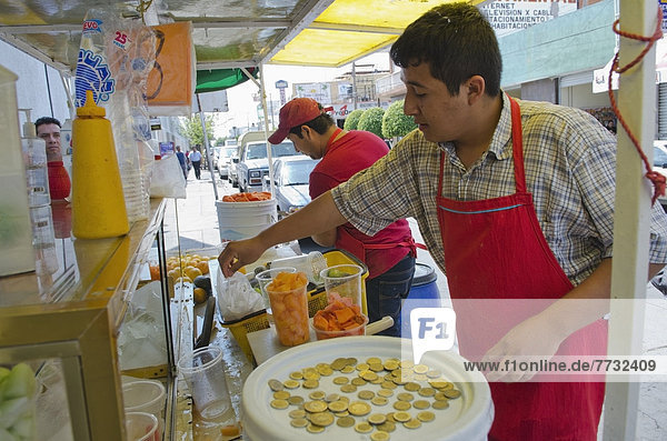 Street side vendor preparing fruit cup  Aguascalientes  Aguascalientes state  Mexico