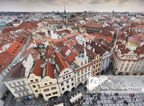 Czech Republic  High angle view of cityscape and people in town square  Prague