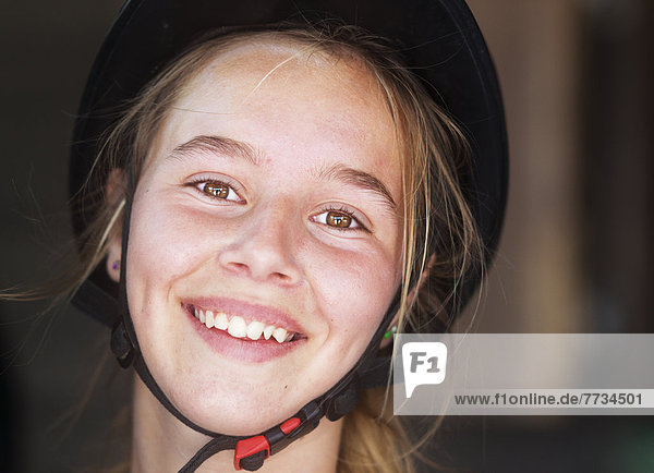 Portrait Of A Young Woman Equestrian Wearing A Black Helmet  Mijas  Malaga  Andalusia  Spain