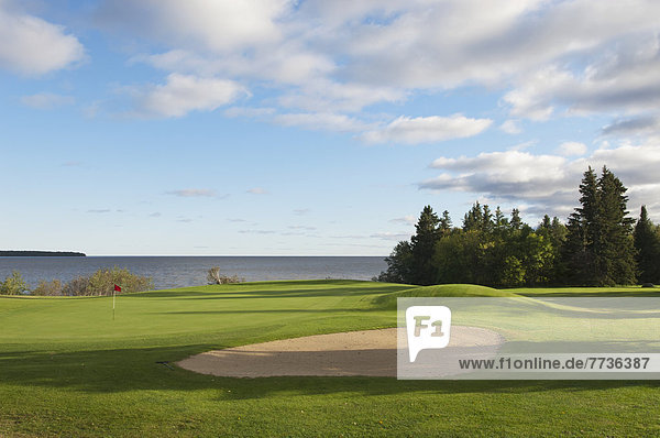 grün  See  einlochen  Golfsport  Golf  Kurs