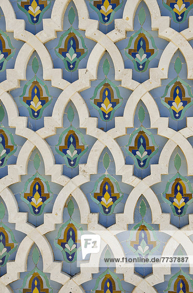 Ornate detail on the wall at the hassan ii mosque Casablanca morocco