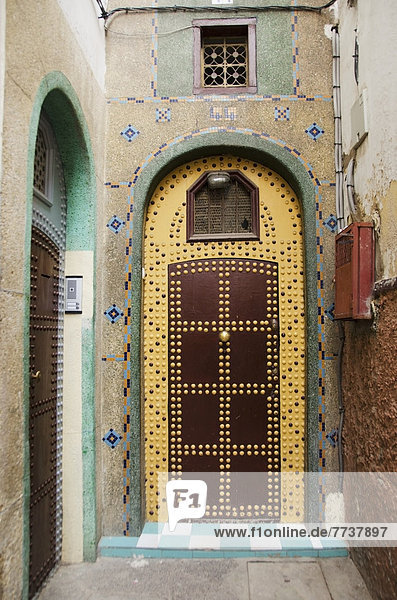 Uniquely decorated door with an arch and a design on the facade of the house Casablanca morocco