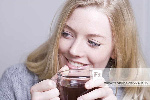 Blonde Woman with Cup of Tea